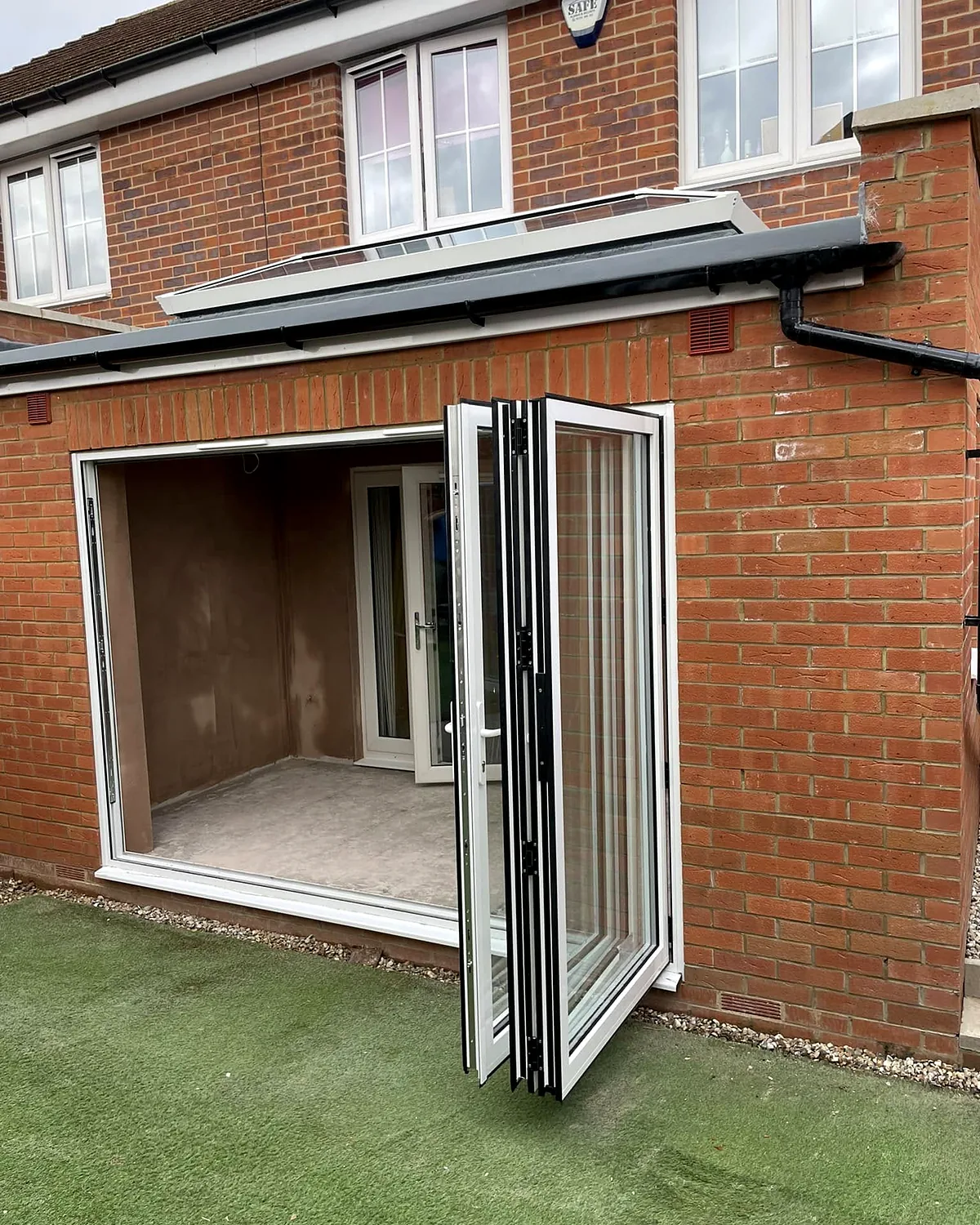Rear extension with bifold doors and a roof lantern