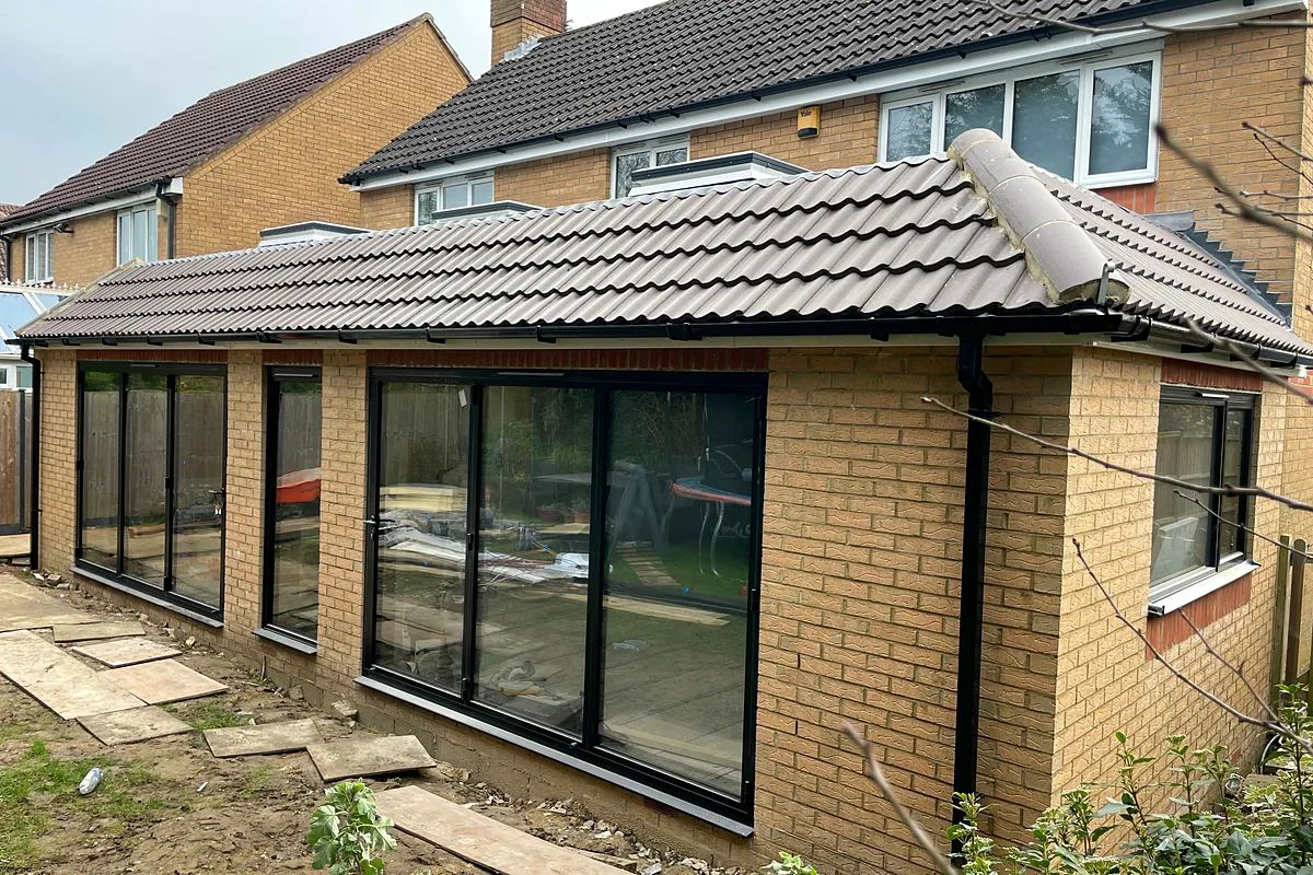 Single-storey rear extension with sliding doors